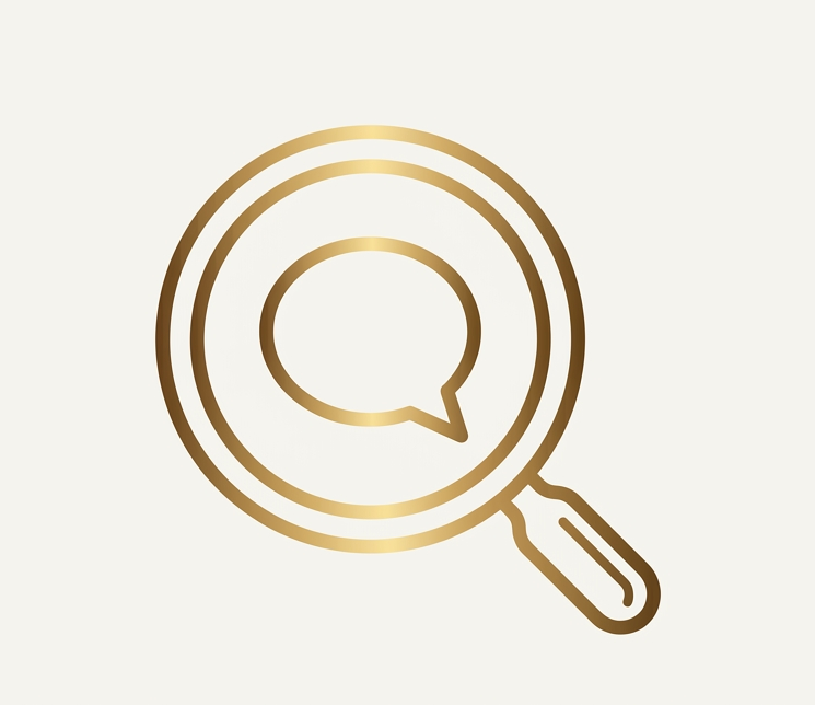 Golden magnifying glass with a speech bubble inside, symbolizing search or inquiry.
