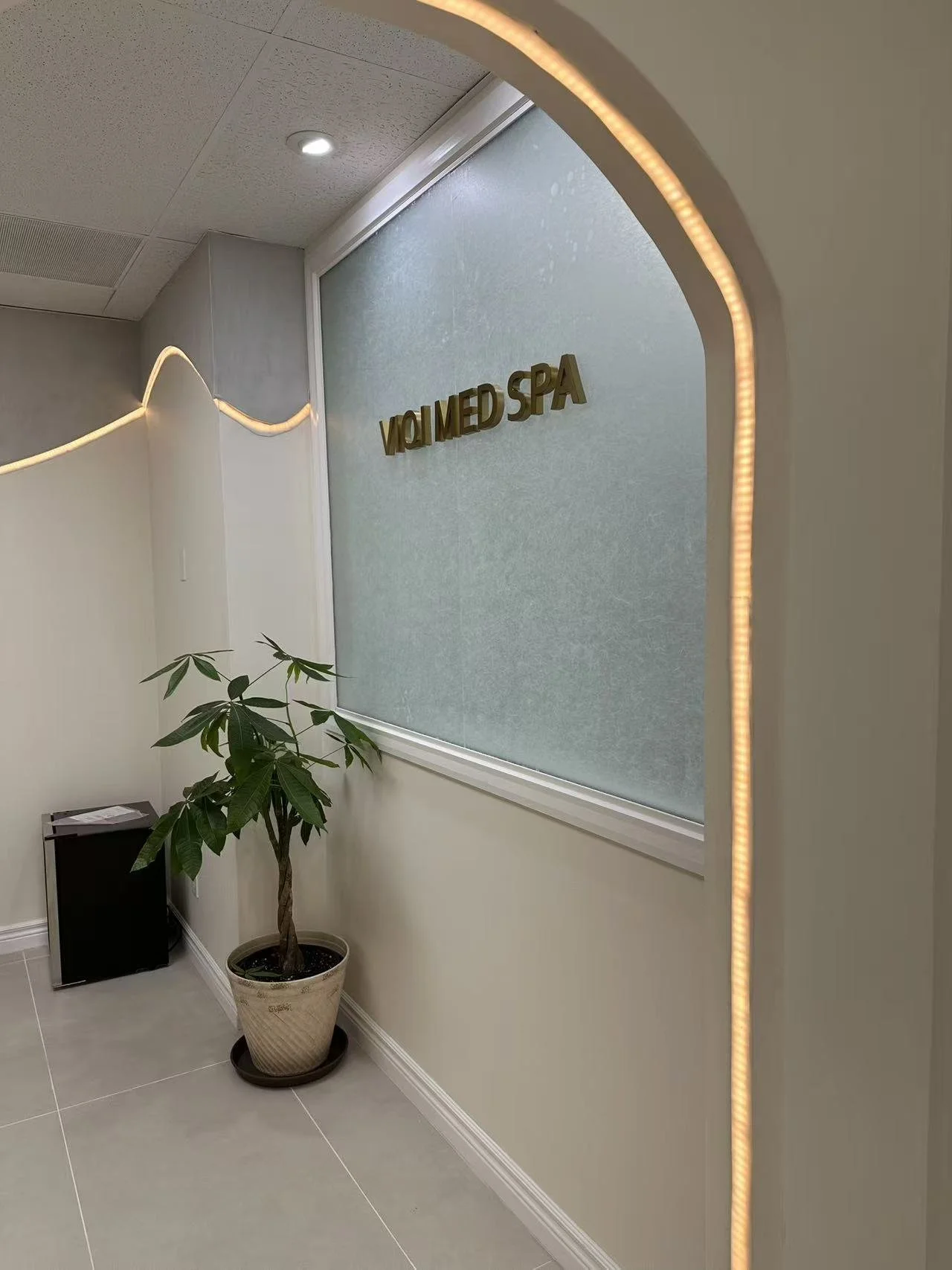 VIQI Med Spa brand wall and interior