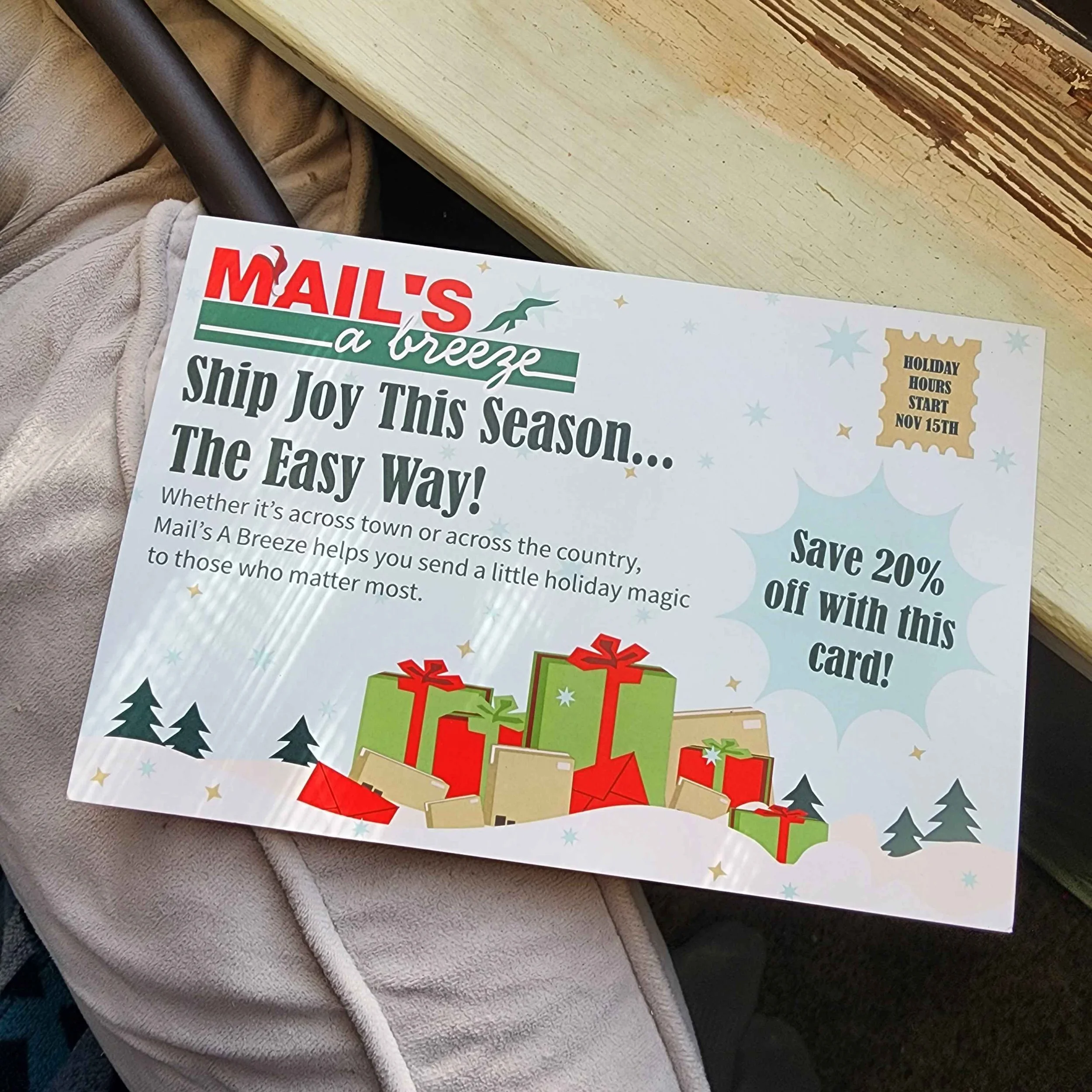 (FRONT DM) This is a design done with The Marketing Bar Pensacola FL. The design brief was to create a direct mail to promote another business they owned, titled Mails a Breeze. This direct mail was to promote Mails a Breeze, as well as their holiday