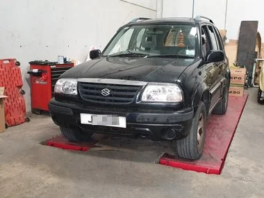 Suzuki Grand Vitara on Jersey registration plates has new headlights fitted and rear fog light and reverse light rewired at our workshop in Murcia along with a free pre import check. This vehicle has been owned from new and is being imported as part 