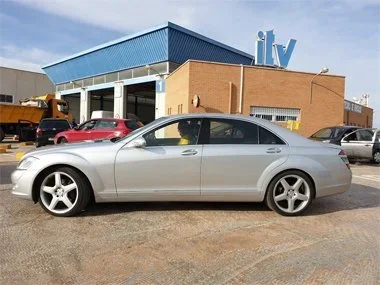 Mercedes Benz S320 CDI L Brabus Edition parked below ITV sign at ITV testing station in Murcia, about to start the import process. We realigned the headlights and rewired the rear fog light to the left hand side to enure that this vehicle passed it's
