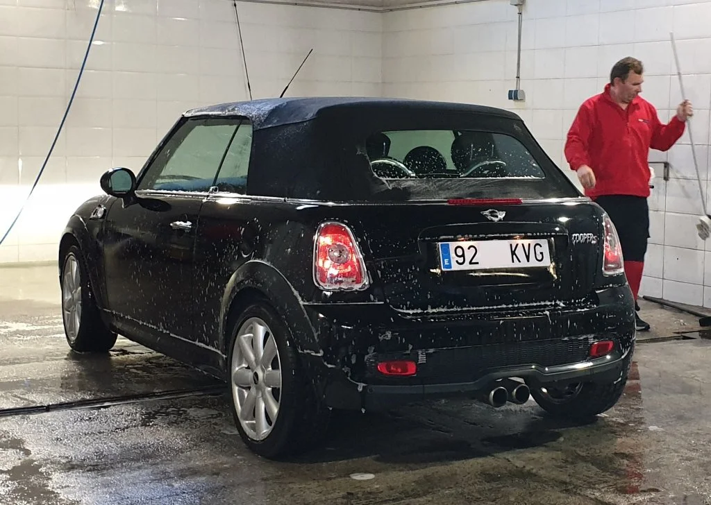 Mini Cooper S Cabrio on new Spanish plates enjoys a last minute wash before being delivered to customer in Malaga region. This vehicle was a difficult import as the VIN plate had been damaged by the seat belt clip and required a replacement from the 