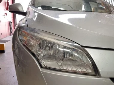 Renault Megane at our workshop in Murcia, checking headlights as part of free pre-ITV check - July 2018.