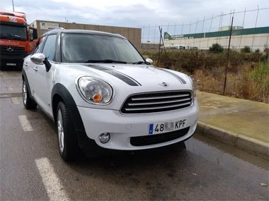 Mini Cooper Countryman formerly UK registered, with brand new Spanish "KPG" plates fitted. We had to change both the front headlights and rear reverse and fog light units on this model before import - September 2018