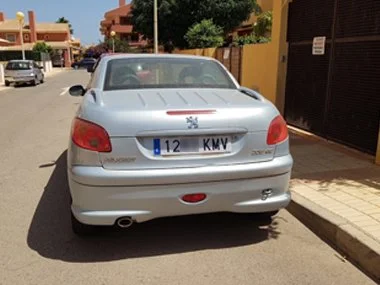 New Spanish number plates fitted at customer's house on Peugeot 206cc imported in their absence - July 2018