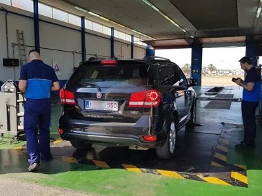 Fiat Freemont 7 Seater registered on Belgian plates begins it's import test. Two engineers are working on this vehicle which is being weighed to ensure it conforms with it's European Type Approval specification - August 2018 