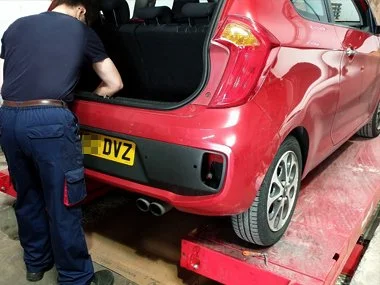 Kia Picanto has rear lights rewired at our workshop in Murcia. This customer stopped off on their way through from France to Malaga region to ensure the fastest possible import. We also fitted brand new replacement headlights to this vehicle prior to