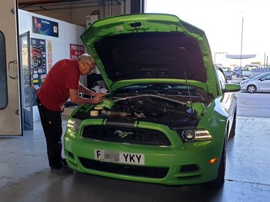 Ford Mustang on UK registration plates but formerly USA registered undergoes a special inspection at a partner workshop in Alicante Region. This vehicle requires quite a number of changes to it's existing specification to comply with Spanish import r