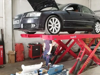 Audi S8 with a huge 5.2 litre V10 engine is thoroughly inspected by one of our mechanics at our workshop prior to it's import test. We realigned headlights and repaired a damaged rear light unit on this vehicle to ensure that the import test was pass