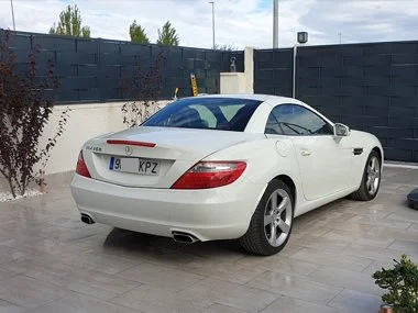 Mercedes SLK200 has it's new "KPZ" registration plates fitted at our customers' home in the Alicante region. We'd realigned headlights and fitted one replacement rear light unit to ensure this vehicle passed it's import test and was registered as qui