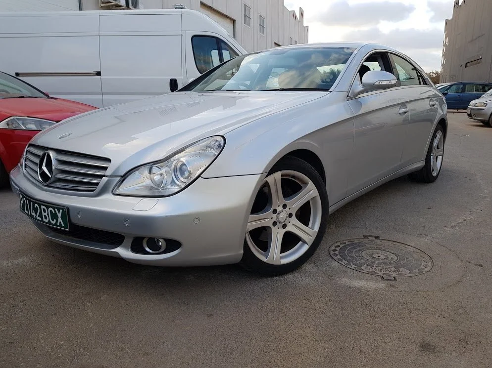 Mercedes CLS-320 Coupe on temporary import plates is now ready for ITV import test, having had the headlights re-aligned and polished at our workshop - July 2018 