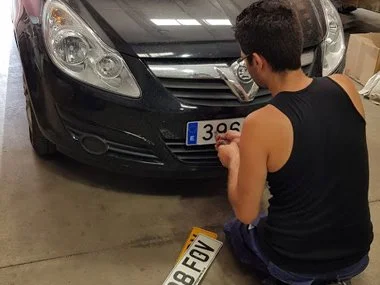 Vauxhall Corsa formerly registered in UK with brand new Spanish registration plates being fitted at our workshop - July 2018.