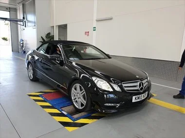 Mercedes E250 AMG Cabrio on UK registration plates undergoes brake test on rolling road as part of Spanish ITV import test at new ITV station in Murcia. This vehicle will pass all tests with flying colours and soon be registered on to new Spanish num