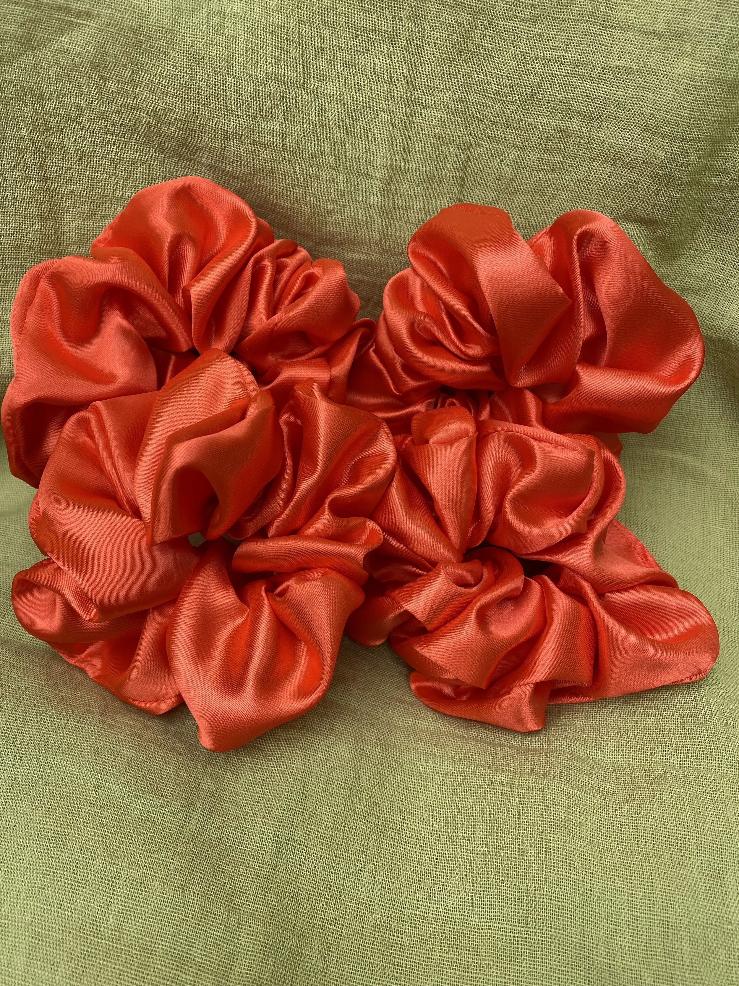 orange satin scrunchie group pic closer.jpeg