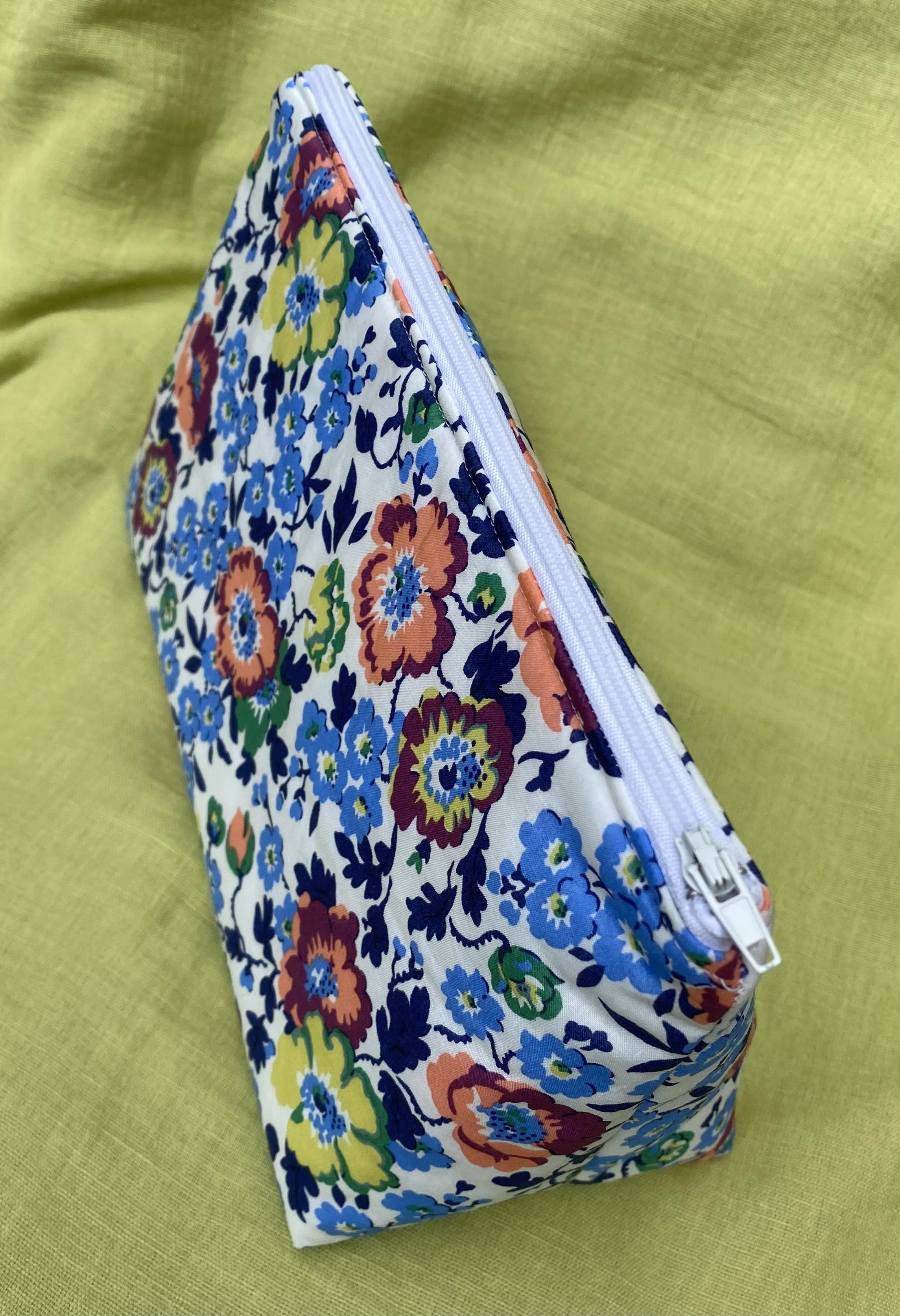 liberty blue floral fabric cosmetic toiletries bag top view.jpeg