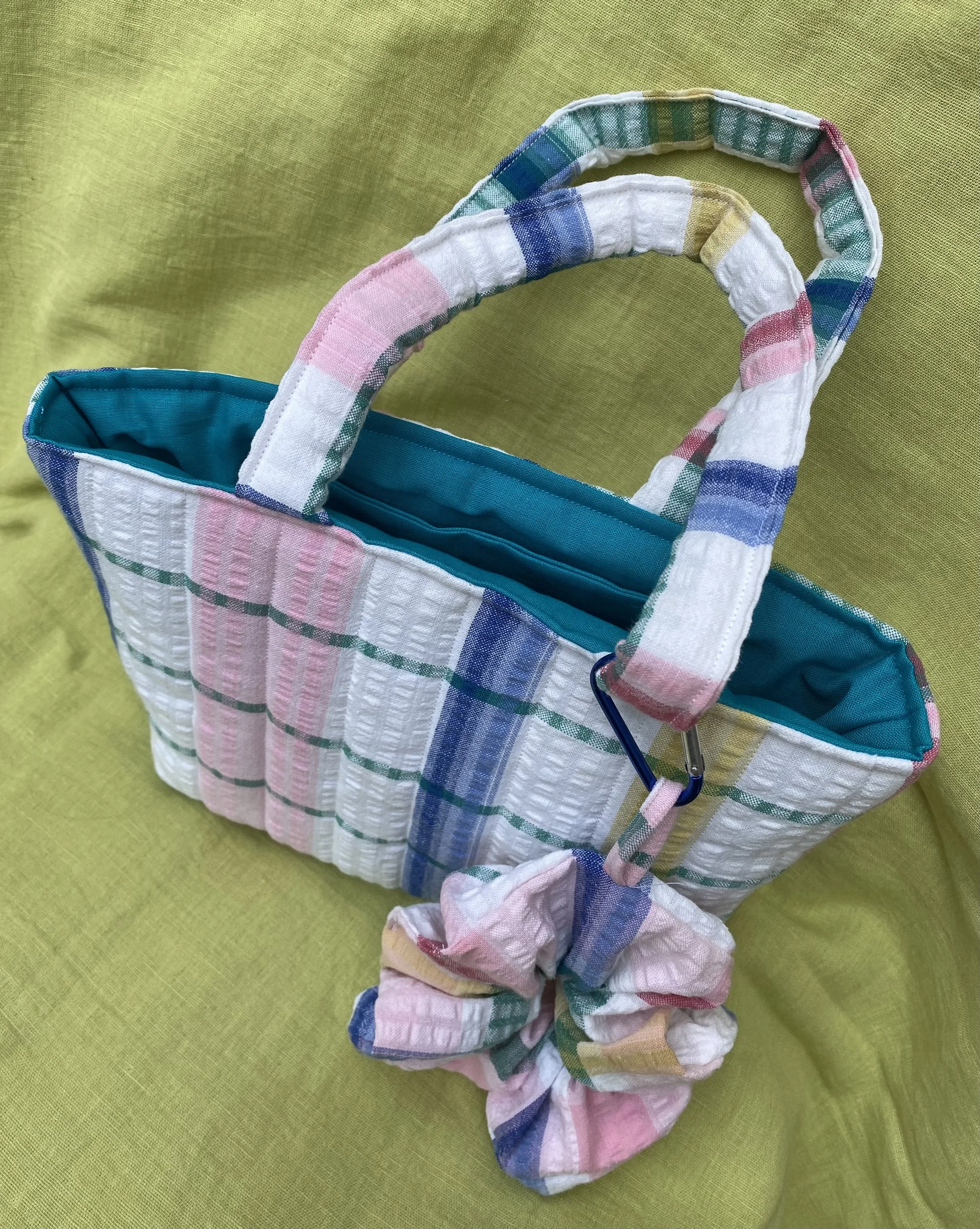 pink white checked seersucker table cloth bag with scrunchie.jpeg
