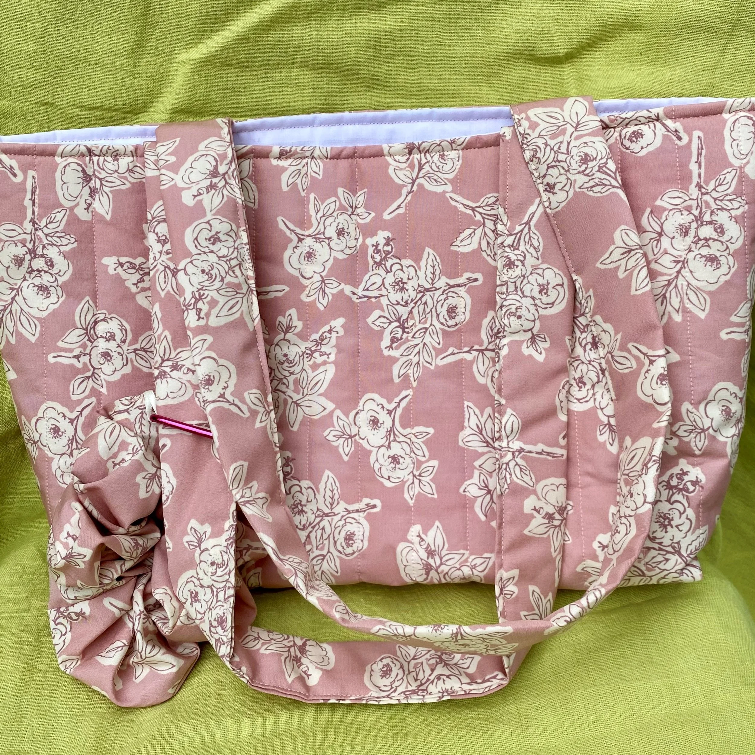 pink floral bag with attached scrunchie.jpeg
