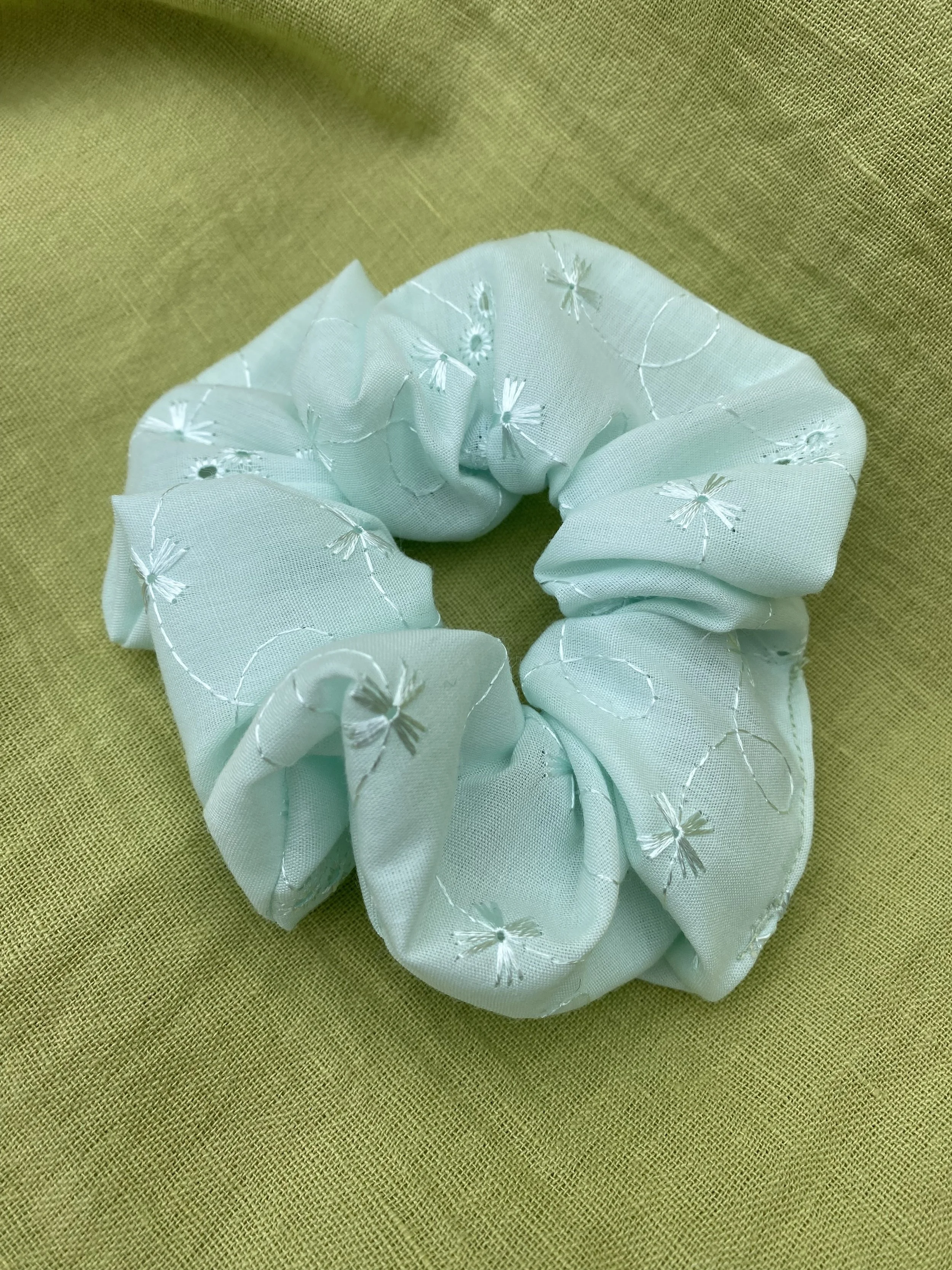 light green embroidery anglaise scrunchie.jpeg