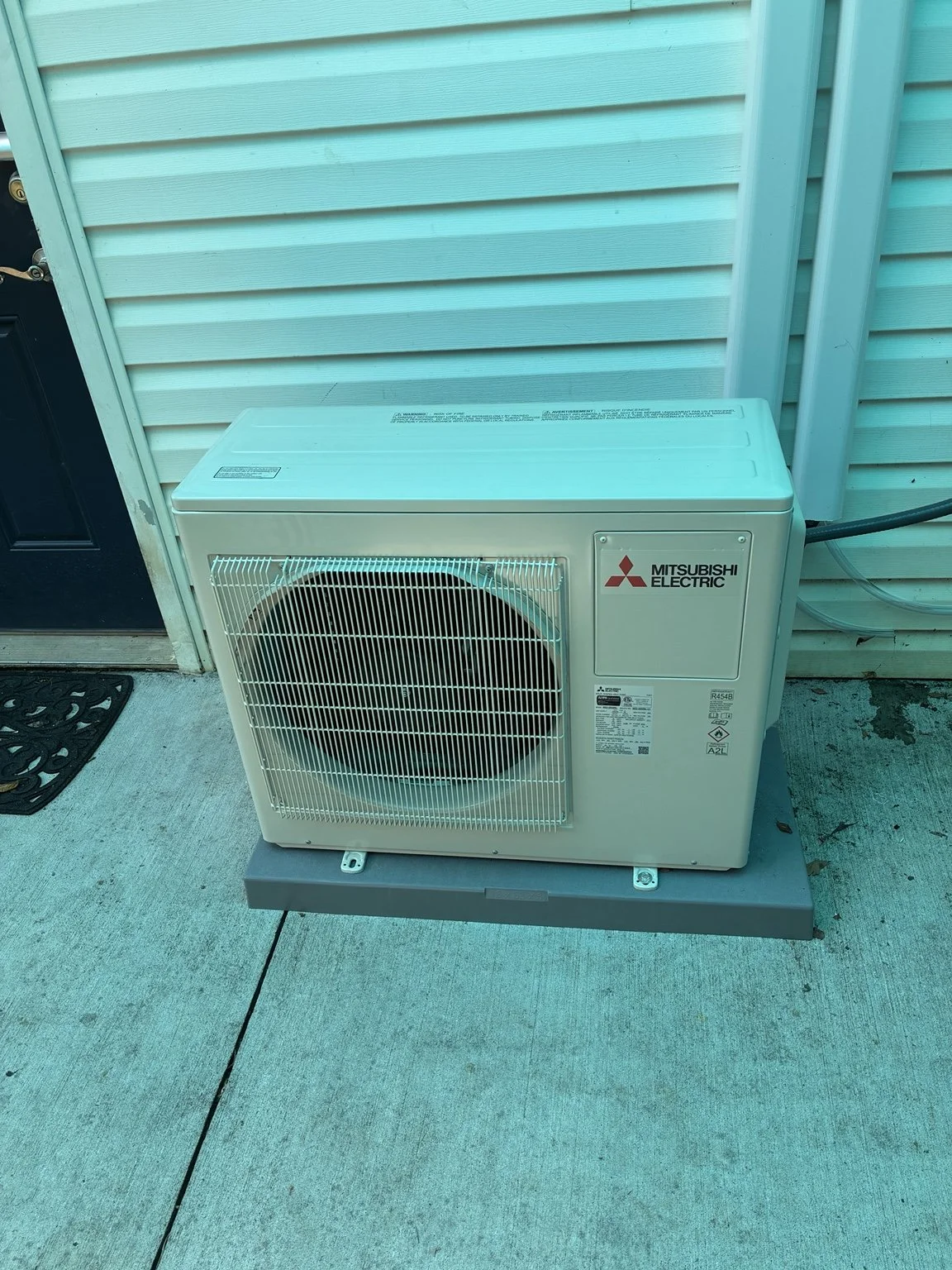 Wall-mounted mini-split outdoor unit.