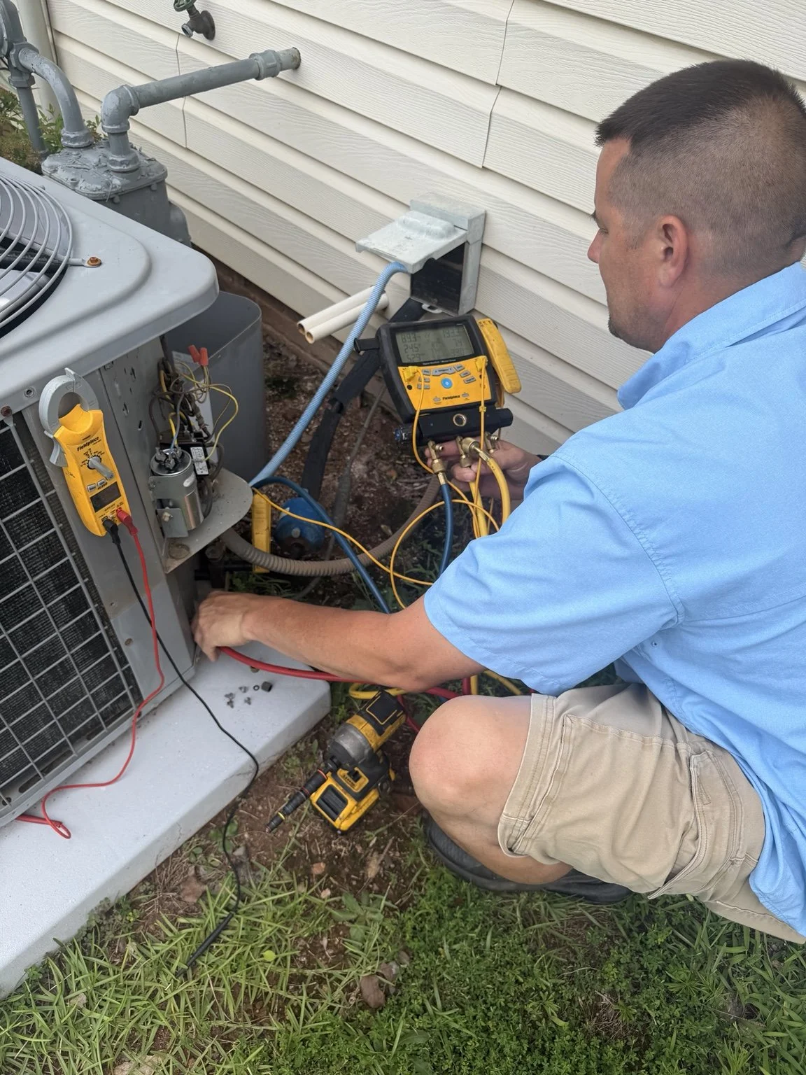 Air-conditioning service and electrical diagnostics at a home.