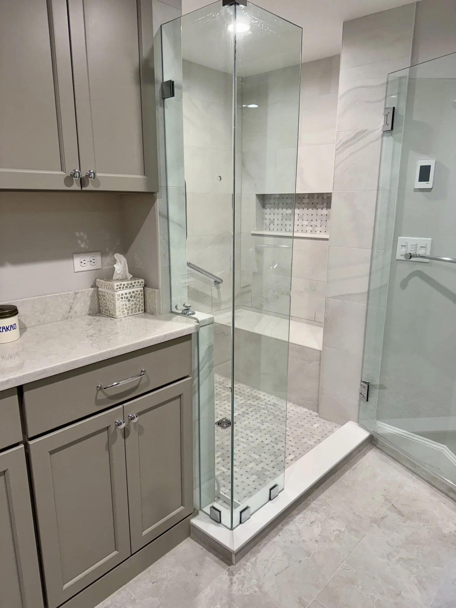 custom tile shower with niche and bench
