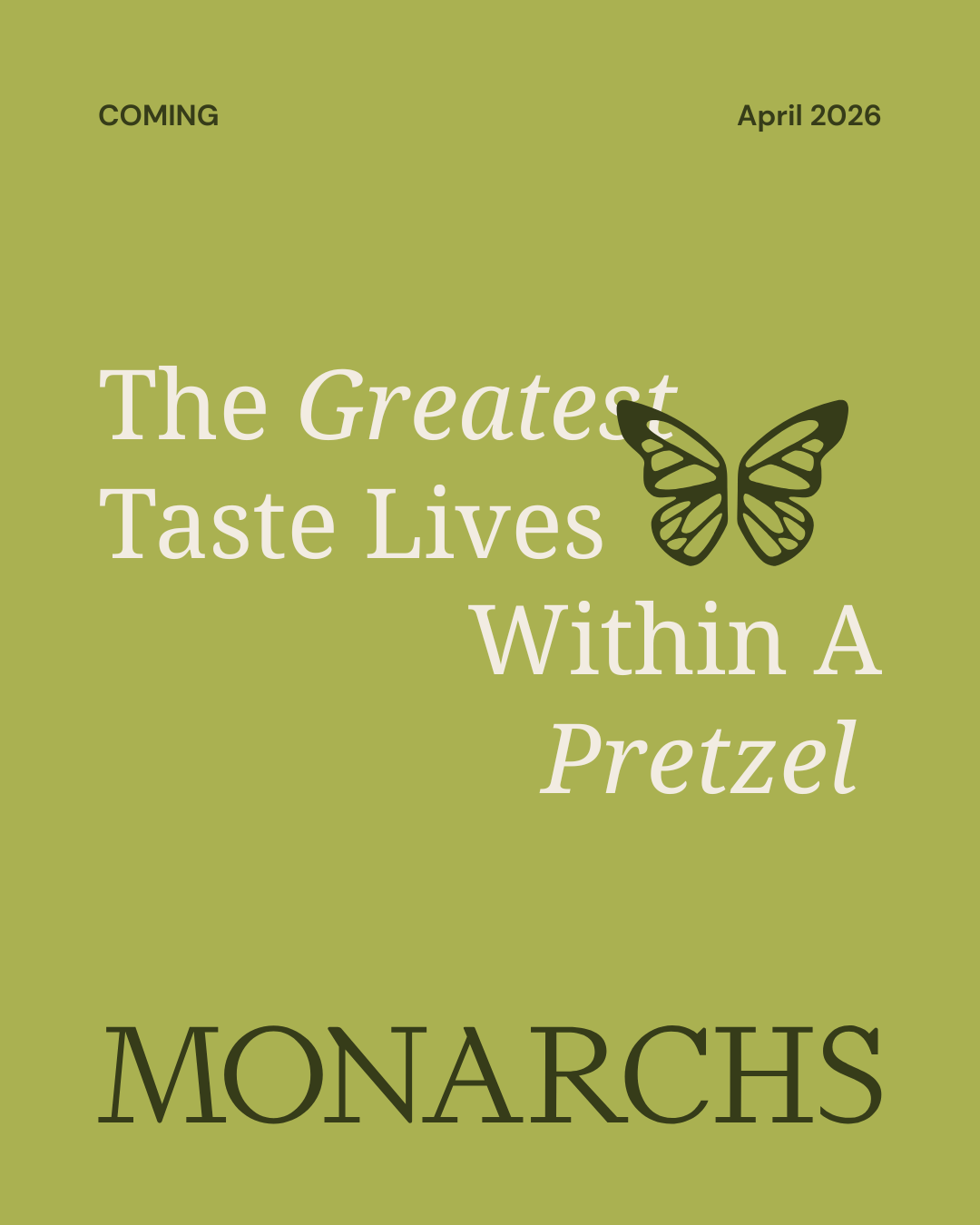 A promotional poster with a green background, announcing a product called "The Greatest Taste Lives Within A Pretzel" by Monarchs, coming in April 2026, with a black butterfly illustration.