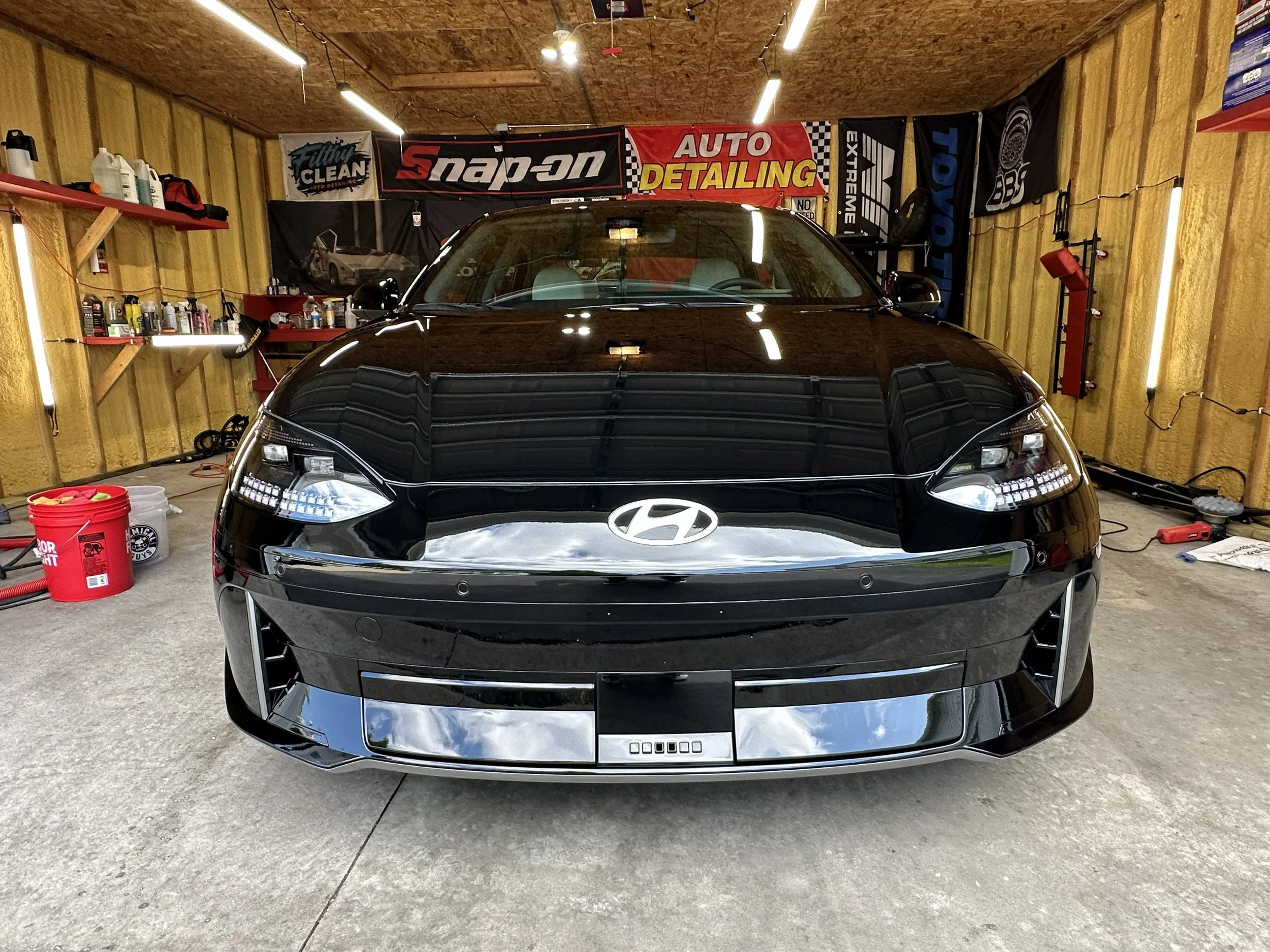 Black Hyundai EV Single stage paint correction completed by filthy clean auto in waukesha wisconsin