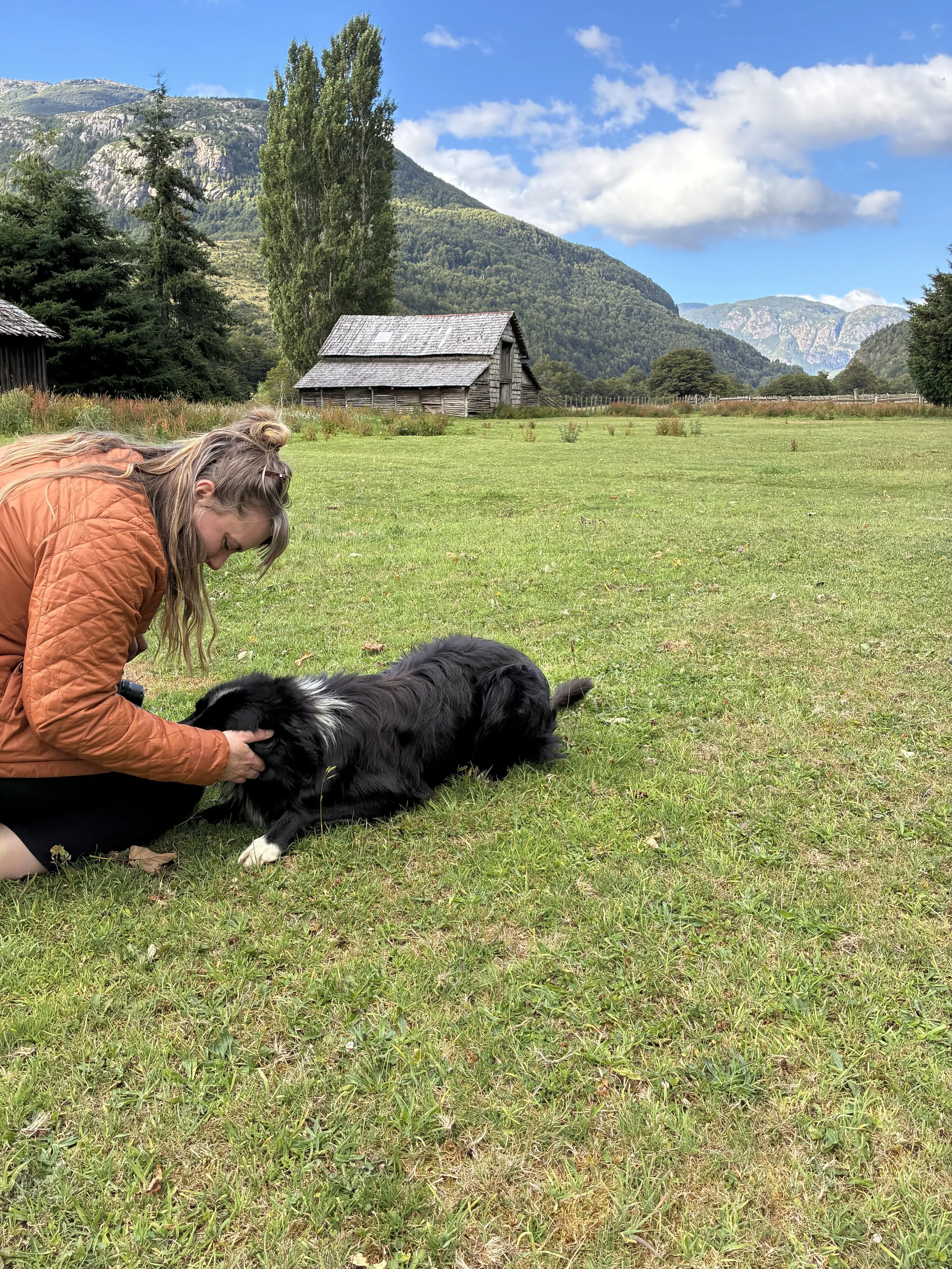 Whitney Playing With Cattle Dog Patagonia.jpeg