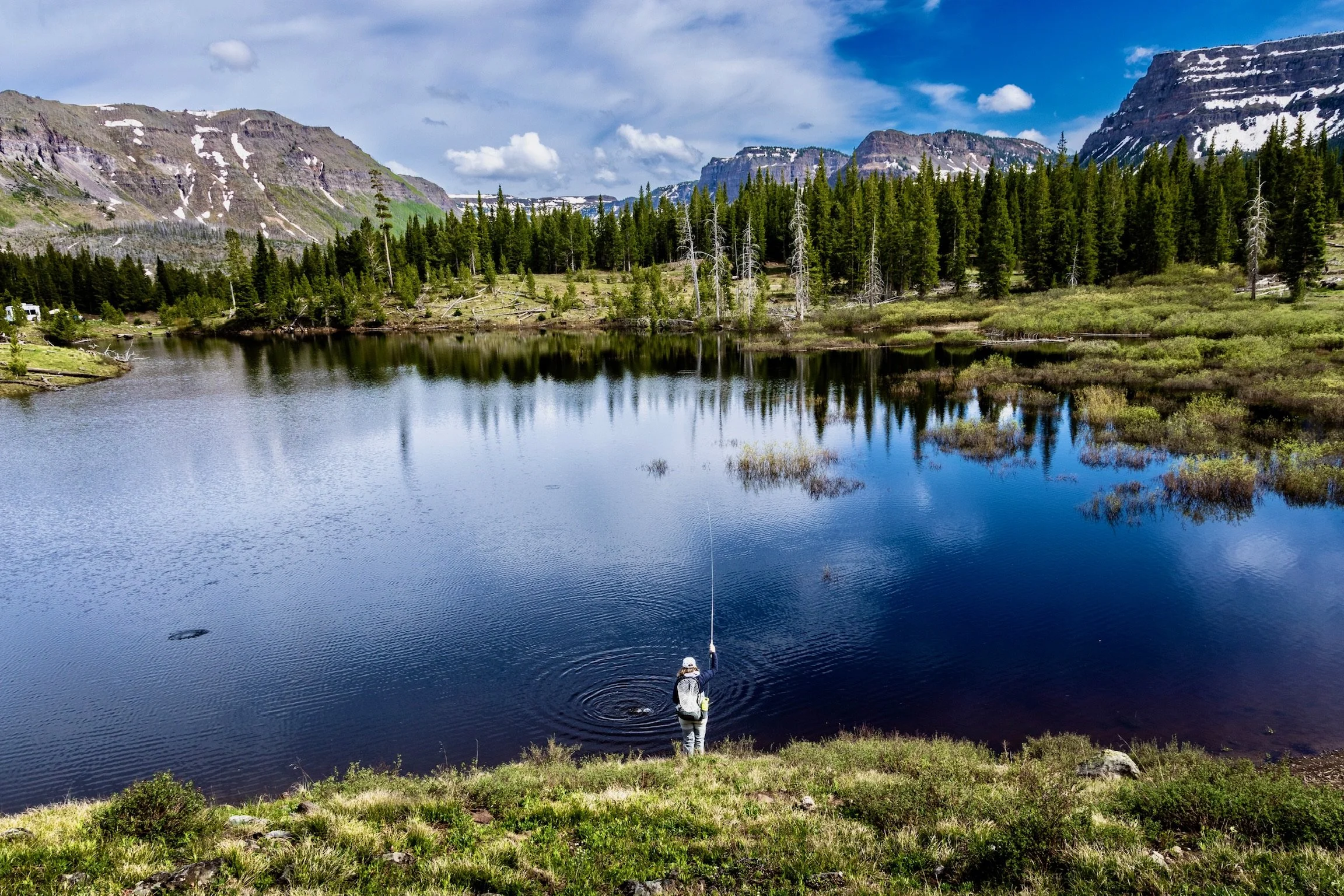 Caley Van Cleave, contemporary abstract landscape painter, enjoying an afternoon of fly fishing in the glorious Flat Tops Wilderness area of Colorado. Photo credit to Kevin Ingham.