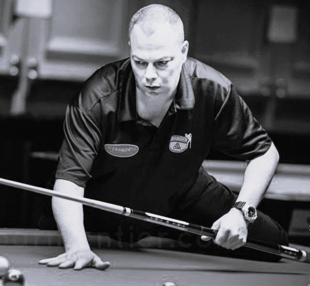 Scott Frost at the table in a high-stakes match against legendary pool champion Efren "The Magician" Reyes