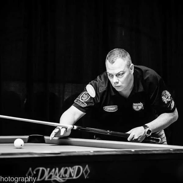 Pool legend Scott Frost — "The Freezer" — lining up a precision shot at the Derby City Classic, one of the biggest pool tournaments of the year