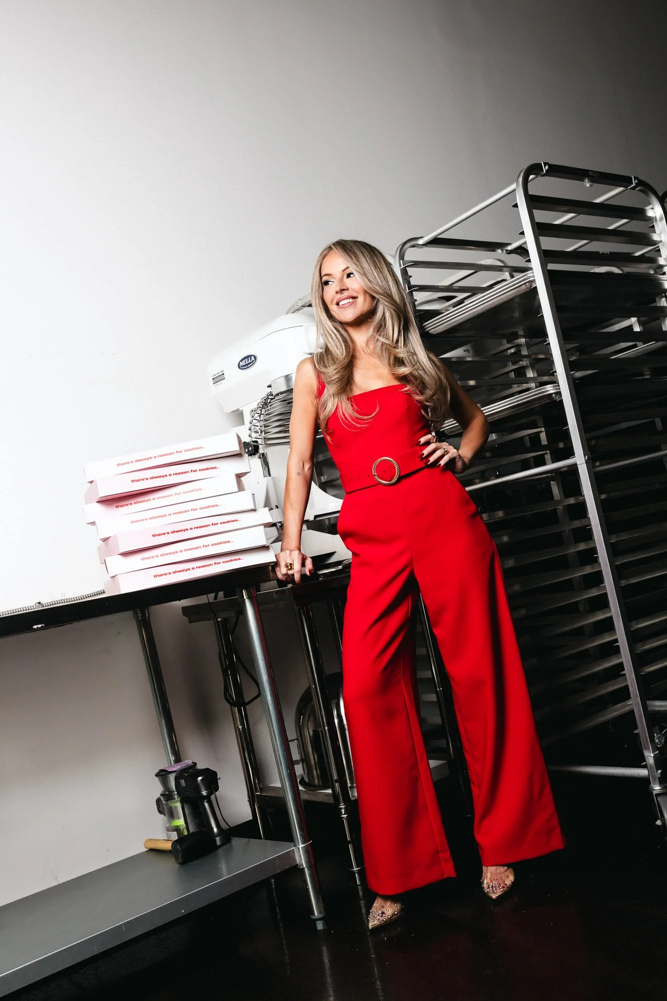 Toronto bakery branding photography blending cookie products with bold, fashion-forward styling in an editorial campaign setting.