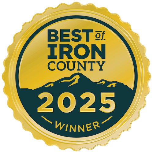 A gold and dark green badge with the text "Best of Iron County 2025 Winner" and a mountain illustration.