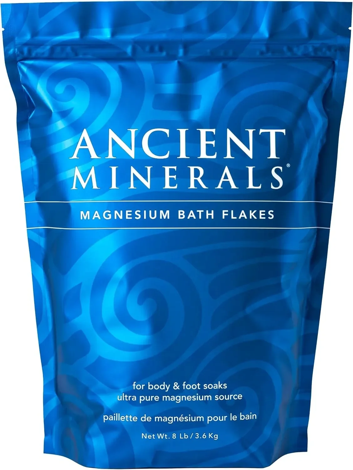 Blue package of Ancient Minerals magnesium bath flakes for body and foot soaks, containing ultra pure magnesium source, weighing 8 pounds (3.6 kilograms).
