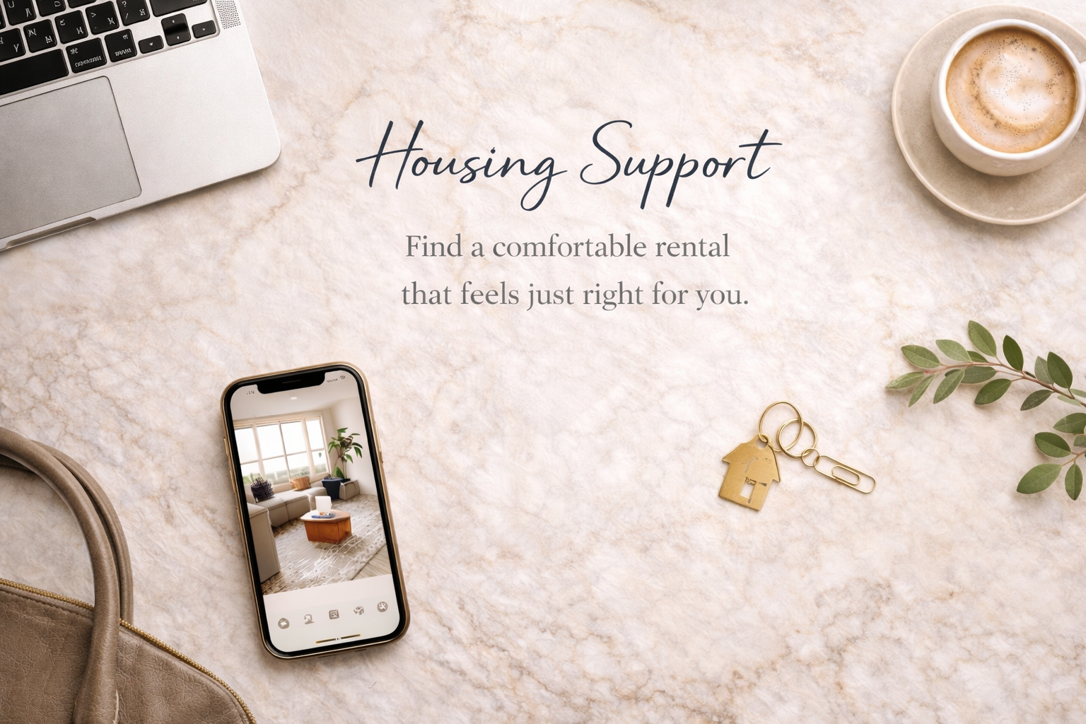 An overhead view of a workspace with a laptop, a smartphone showing a living room, a cup of coffee on a saucer, a small green plant, a set of house keychains, and a beige handbag on a marble surface. The text in the center reads 'Housing Support: Find a comfortable rental that feels just right for you.'
