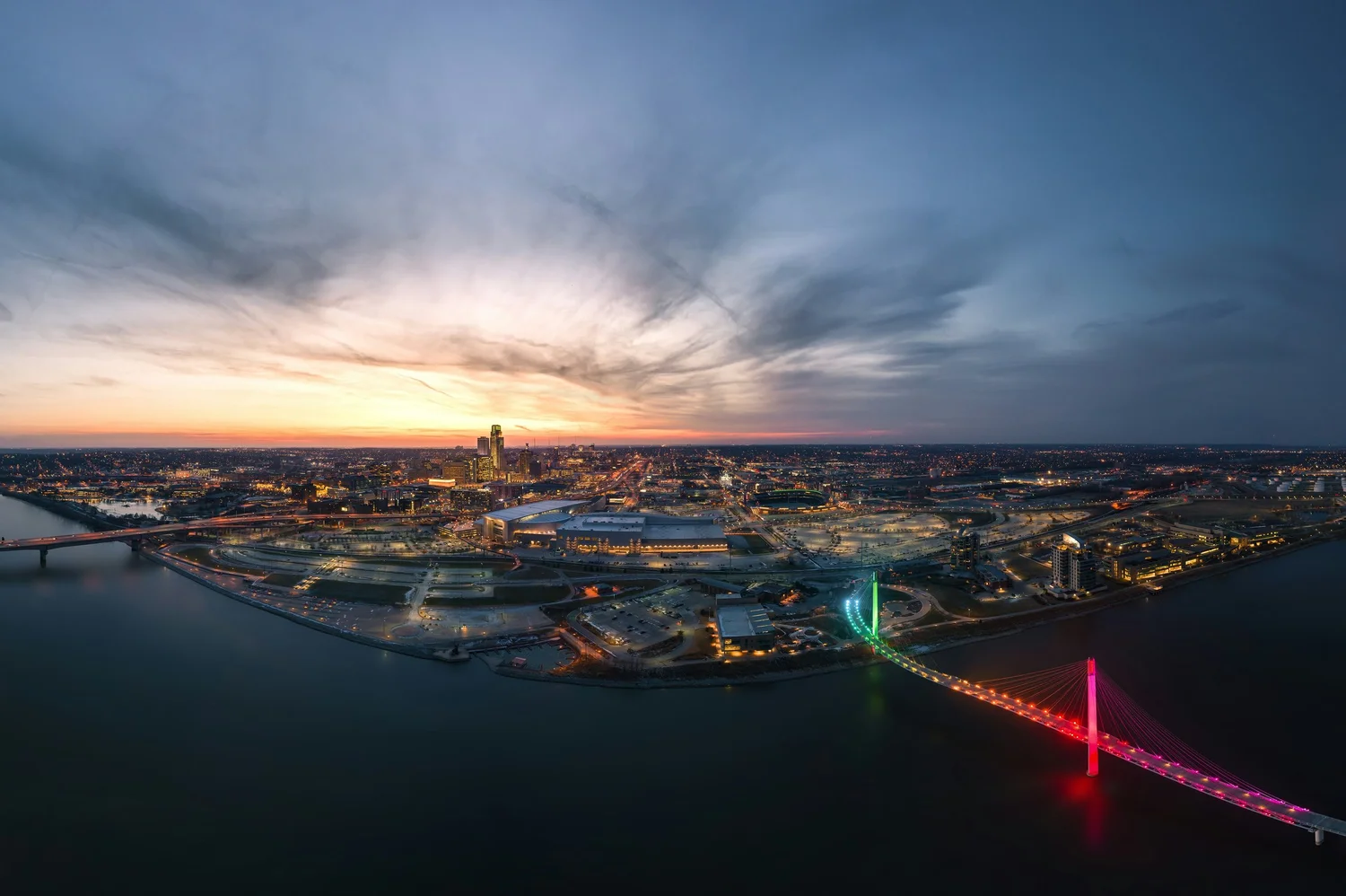 Omaha, Nebraska skyline at dusk with the Bob Kerrey Pedestrian Bridge