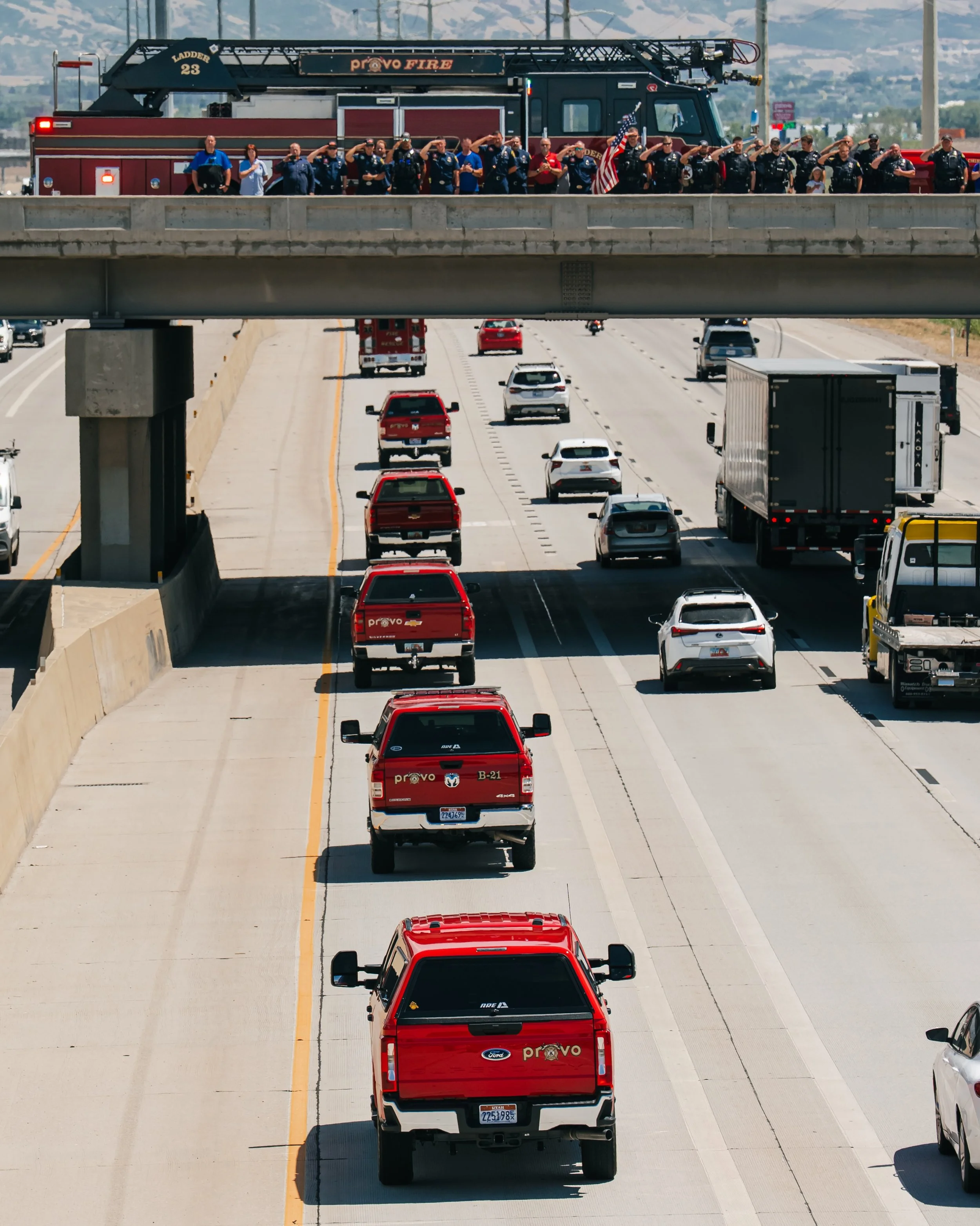 Community Members Salute the Long Family Procession in Provo

Firefighters, police officers, and community members line the University Parkway overpass in Provo, Utah, to salute the motorcade of the Long family as it traveled from Taylorsville to Spa