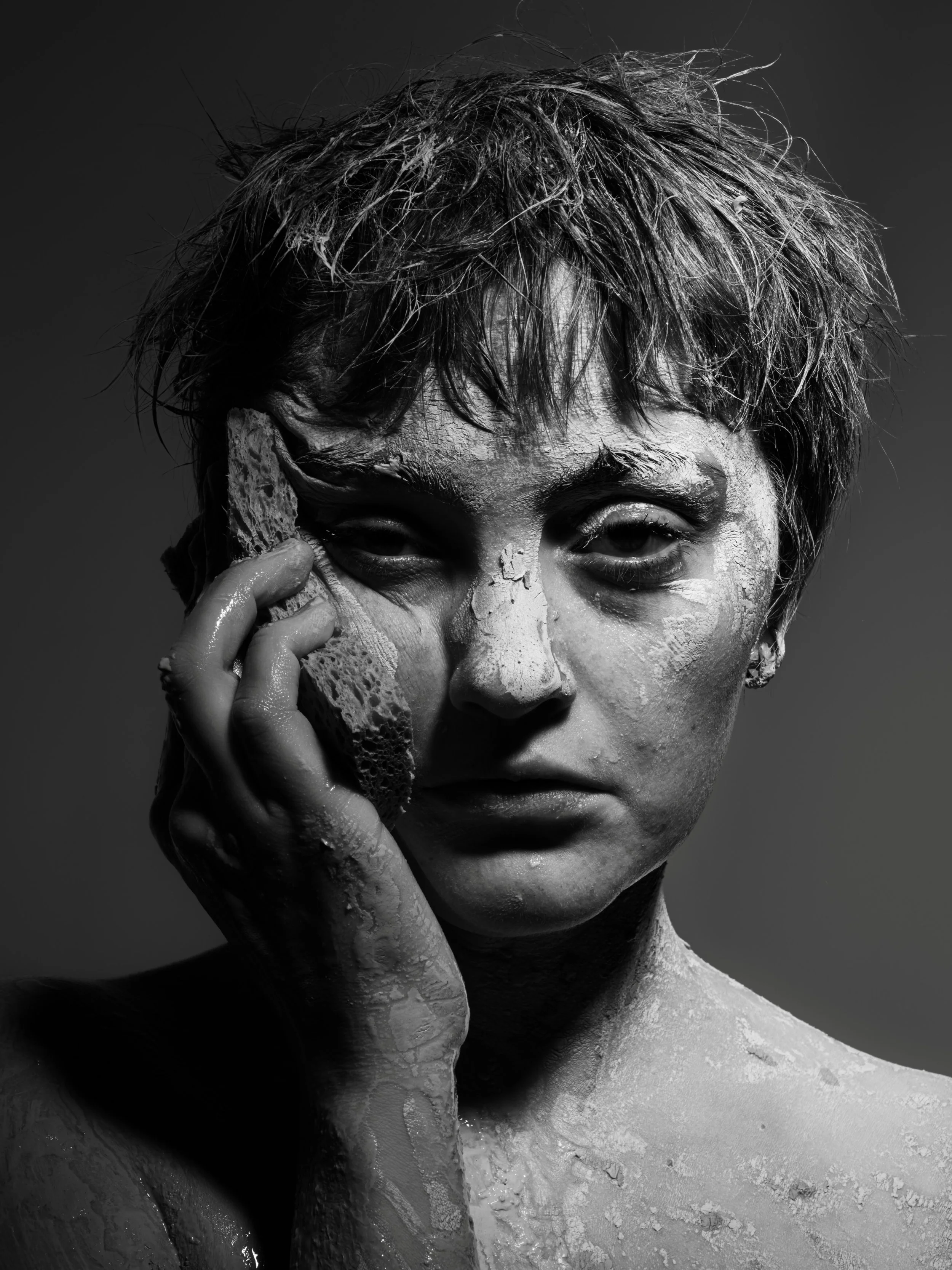 &ldquo;I am Jane Doe&rdquo; written on the tie that covers her mouth. 

The night before this studio shoot it hit me that clay can be a metaphor for the emotions, trauma, and layers built up that most women live with because of sexual assault. 

@per