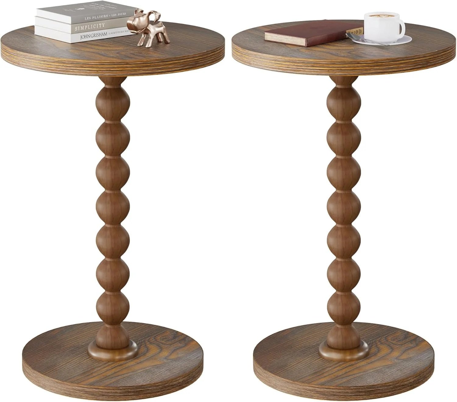 Two round wooden side tables with turned bases, each decorated with books and a cup of coffee or tea.