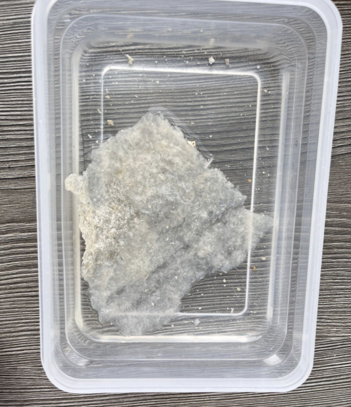 By submerging the material samples in water for no more than 6 seconds, the material's structure can be altered, allowing for delicate bends. If the shape is held in place, the material dries after several hours in the desired form.