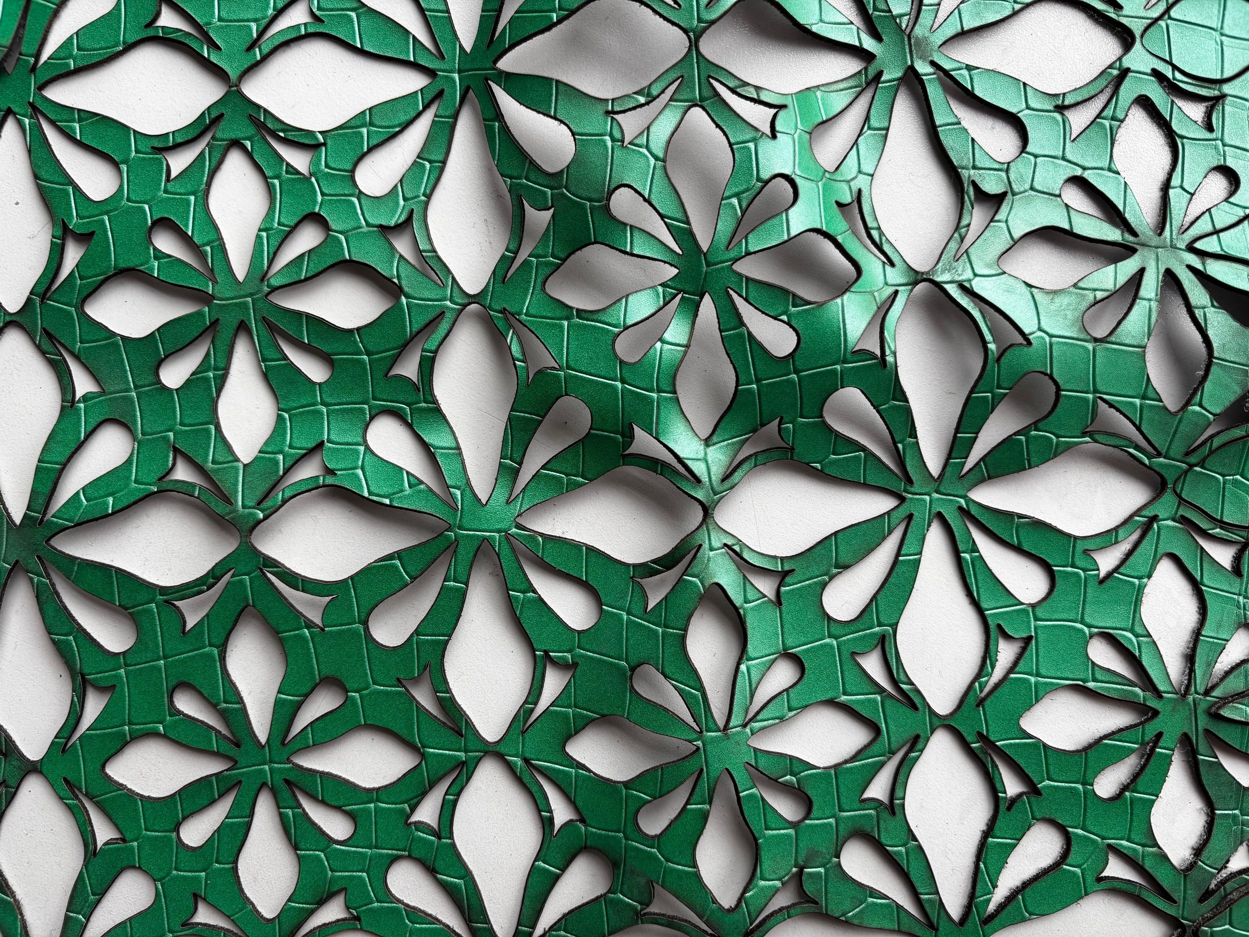 Leather with texture :
Another type of leather, that itself has texture to see if it gives more dimension to the structure