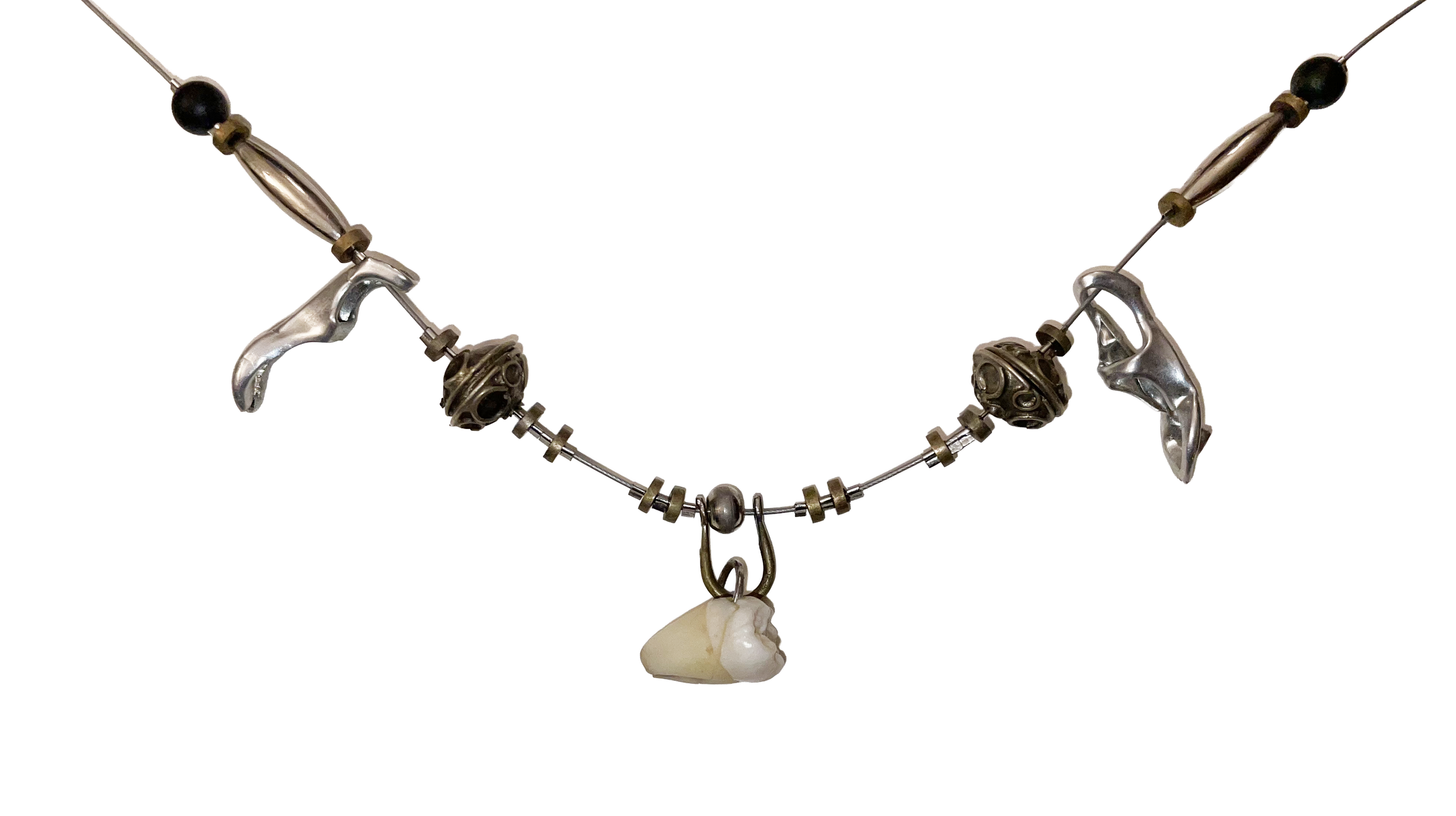 Wisdom necklace (2023) Artistʼs tooth, can tabs, metal beads, wire, found and salvaged materials