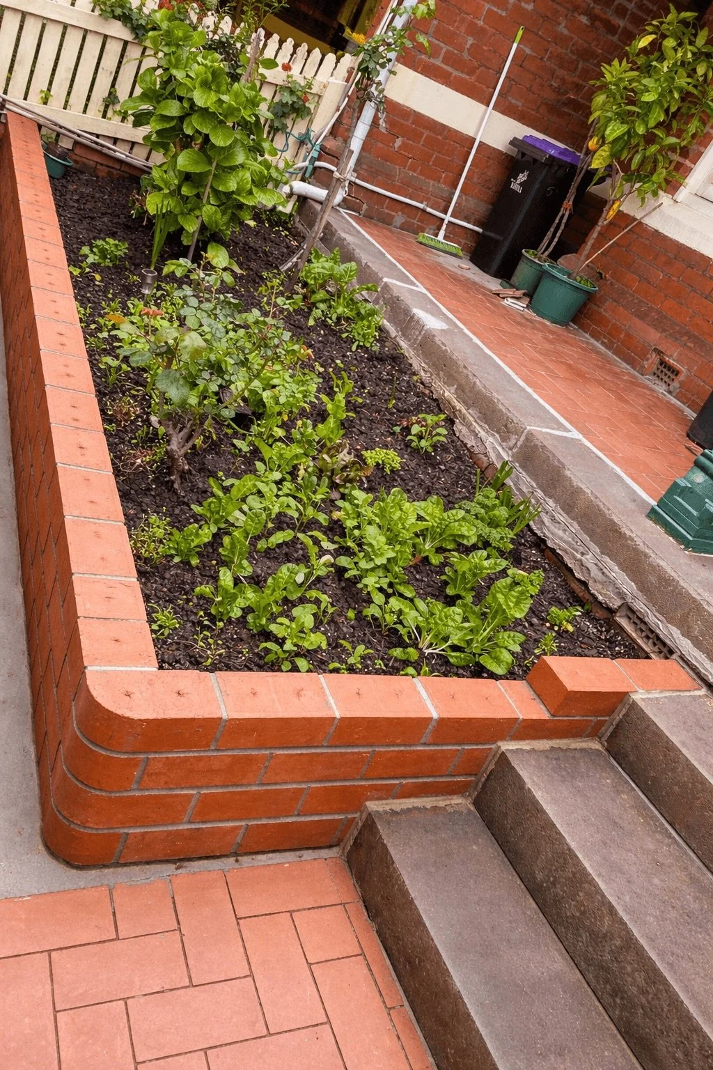 Brick garden bed built and stairs touched up for safety, Eaglemont
