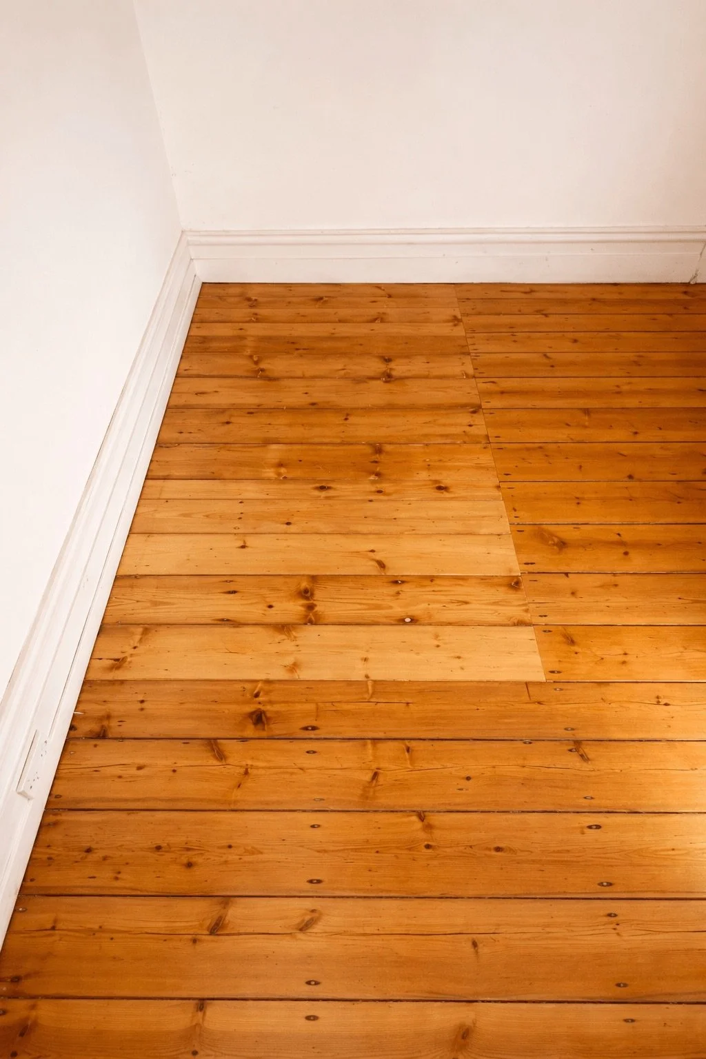 Rotted timber floorboards replaced and blended back into existing floor — Surrey Hills