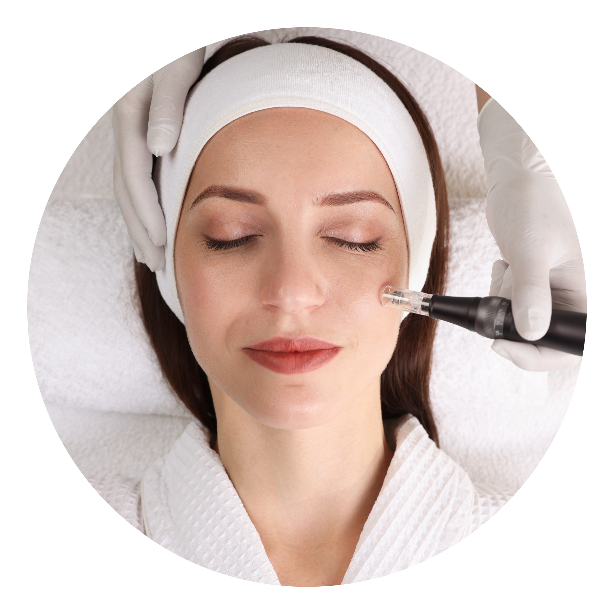 Close-up of a woman receiving a cosmetic treatment with a fine needle on her face, lying with eyes closed, in a spa or clinic setting.