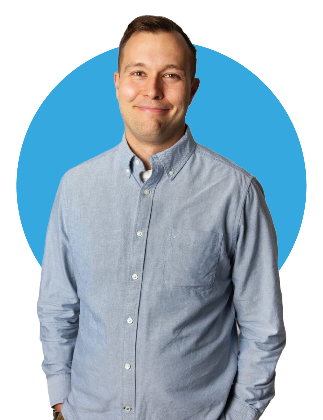 Dan Wilson smiling. He's wearing a collared, light blue shirt.