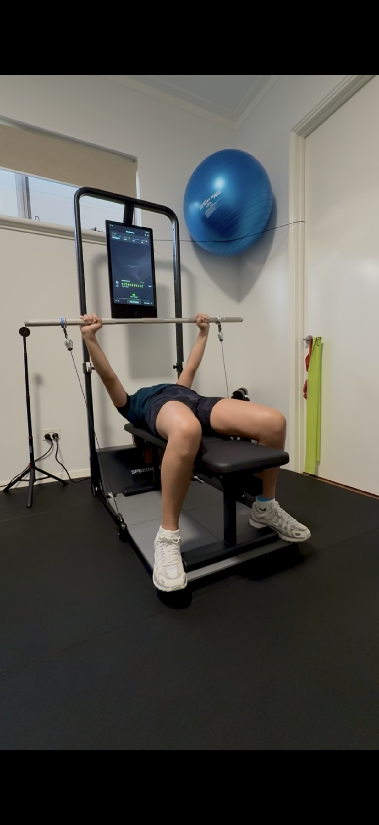 Patient performing strength assessment on VALD equipment at The Performance Room Burns Beach