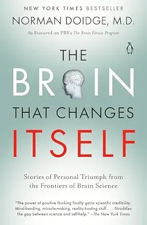 Book cover titled 'The Brain That Changes Itself' by Norman Doidge, M.D., featuring a silhouette of a human head with a brain inside, and a small penguin icon.