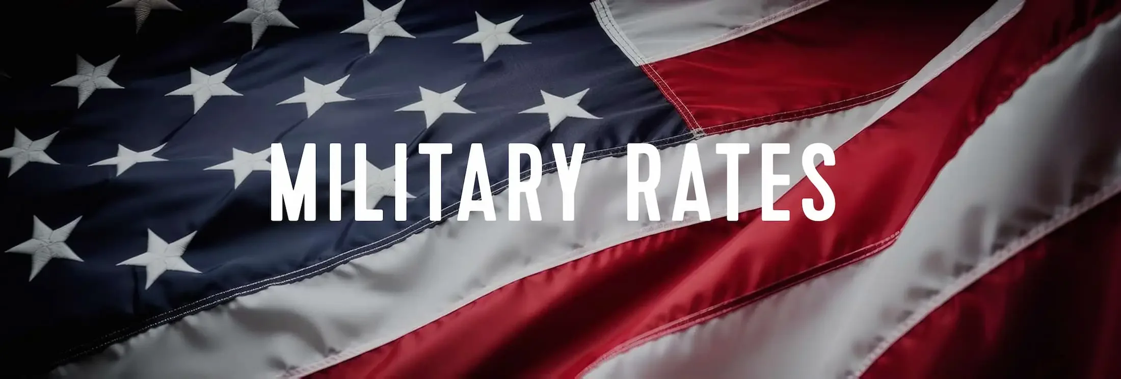 Close-up of an American flag with the text 'Military Rates' overlaid.