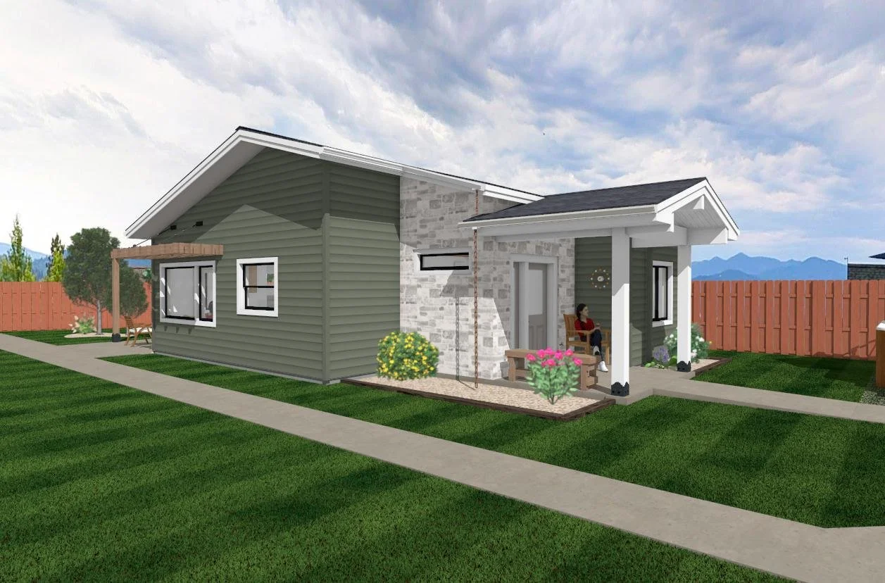 A modern suburban house with green siding and stone accents, front porch with wooden bench, woman sitting on the porch, lawn with flowers, and a wooden fence in the background.